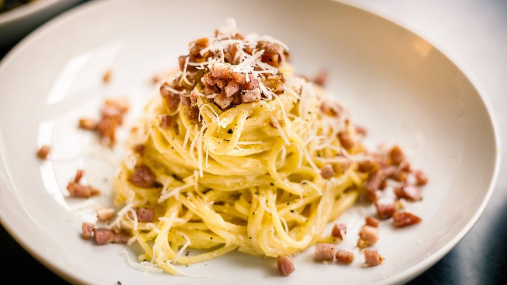 A beutifully plated pasta carbonara, one of Europe's timeless dishes