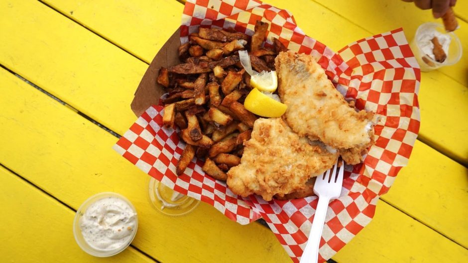 A delicious meal of fish and French fries from a street vendor