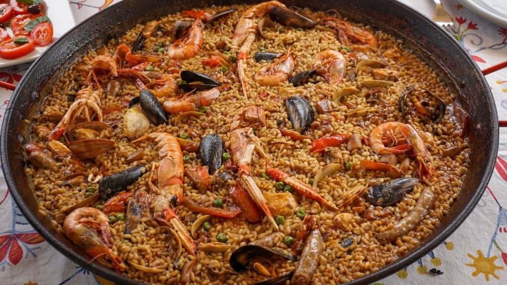 A dish of paella, the traditional seafood rice from spain, one of Europe's timeless dishes
